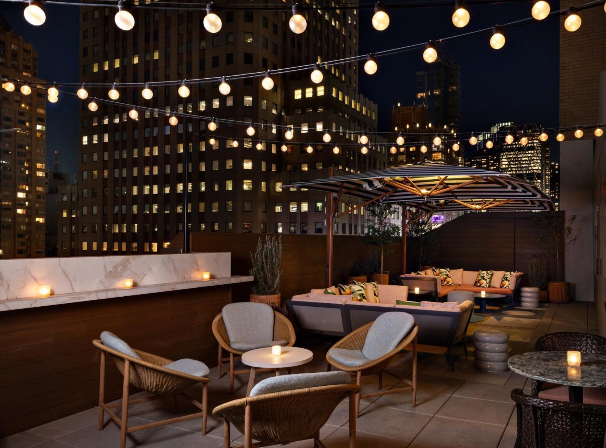 Отель Kimpton Theta New York - Times Square By Ihg Экстерьер фото The rooftop bar at the Standard East Village