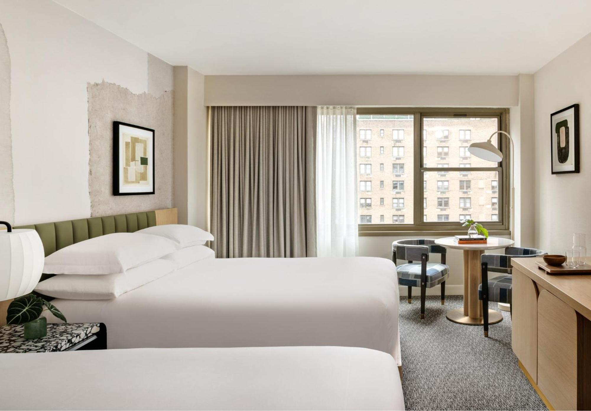 Отель Kimpton Theta New York - Times Square By Ihg Экстерьер фото A room at the Hotel 57