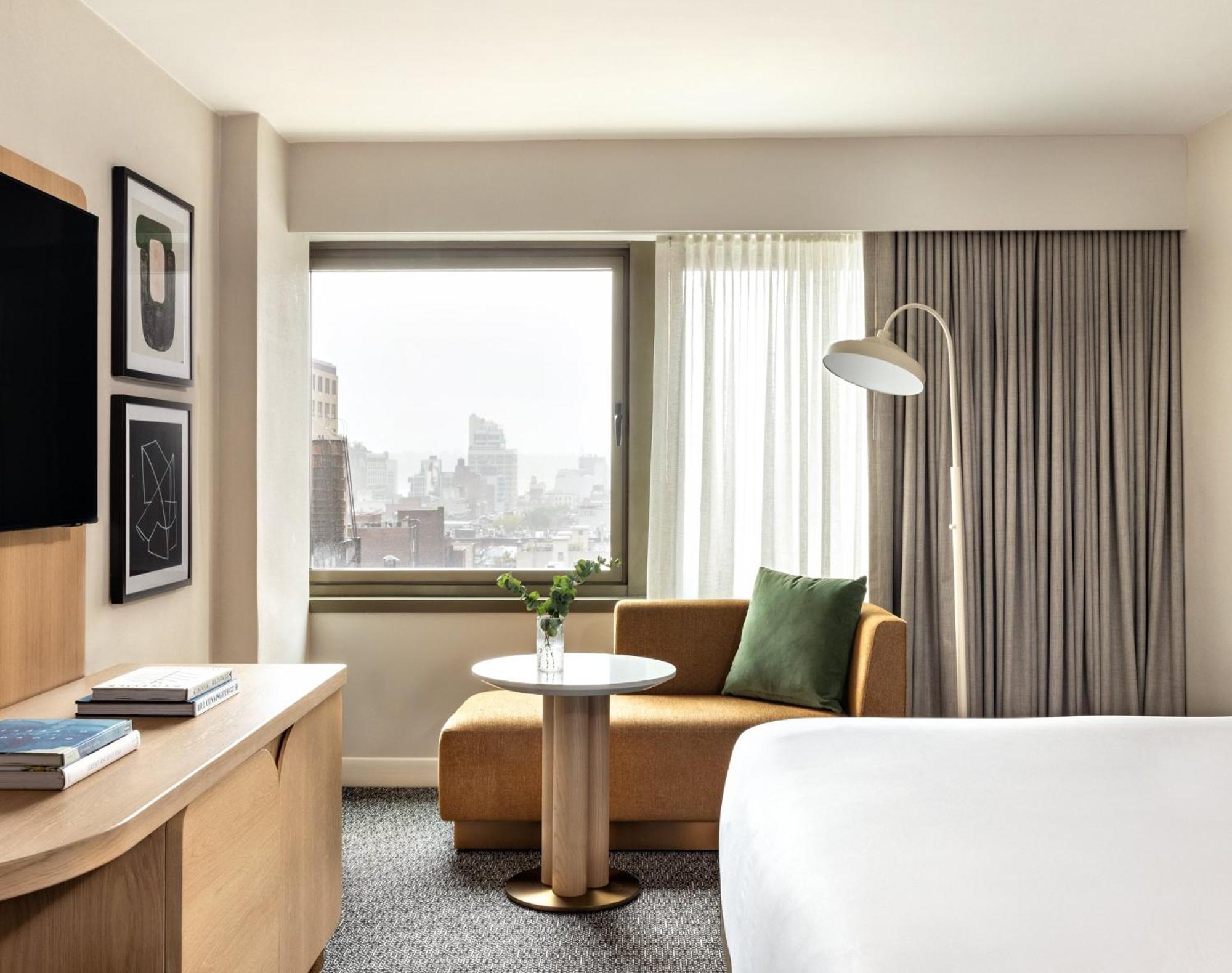 Отель Kimpton Theta New York - Times Square By Ihg Экстерьер фото A guest room at the Hotel Commonwealth